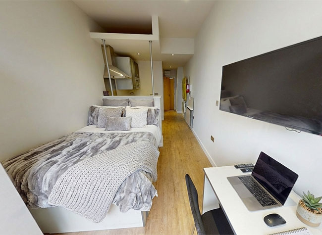 View of bed in 66 queens road studio