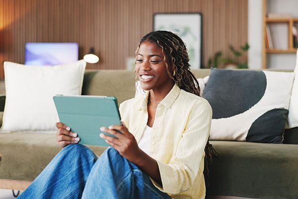 student-on-tablet university student on video call on tablet